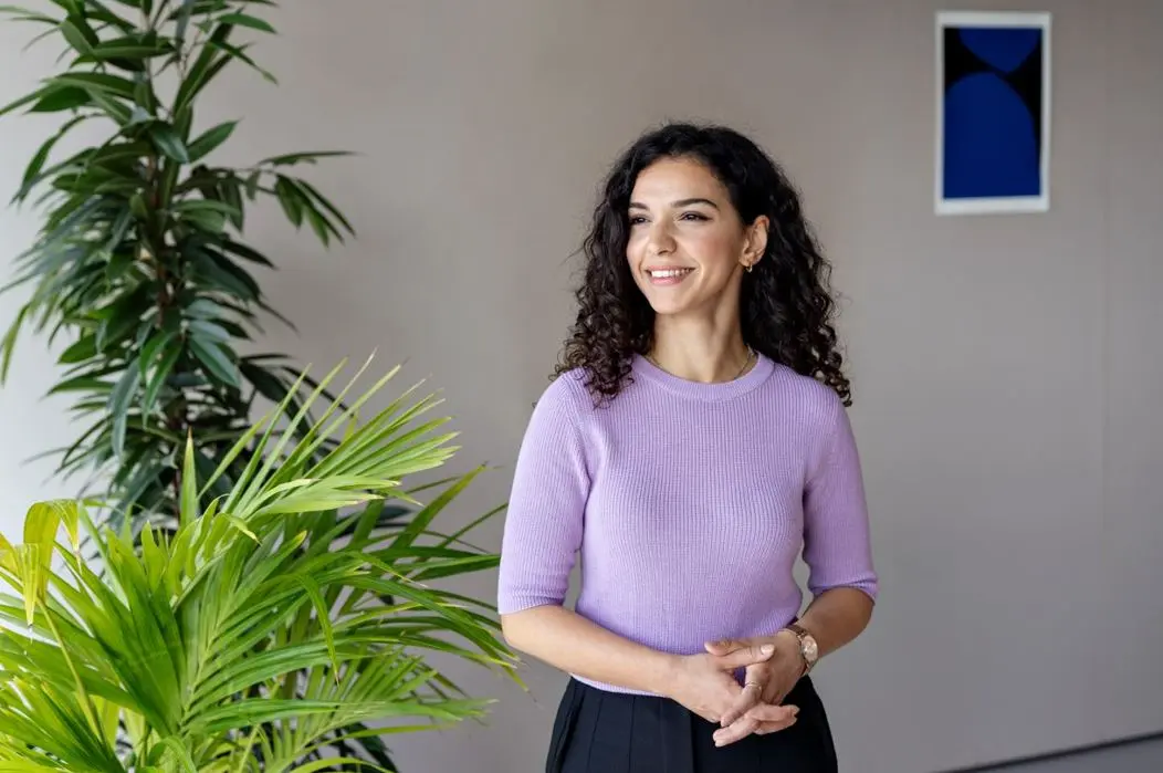 glimlachende vrouw Coach van USG Restart
